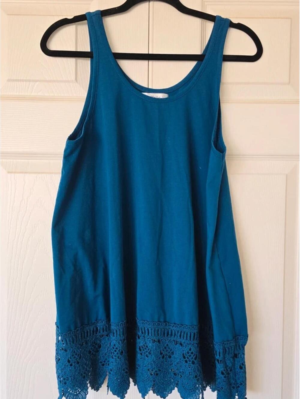 Loose flowy tank with embroidered crochet detail at bottom